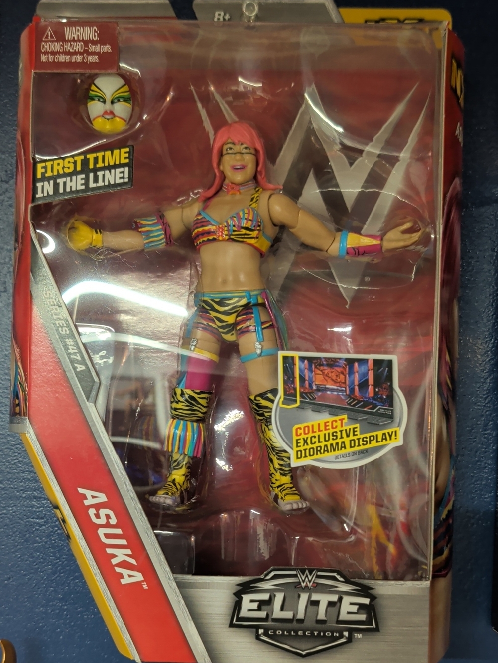 WWE Asuka Action Figure - Pink, Yellow, Black, Blue